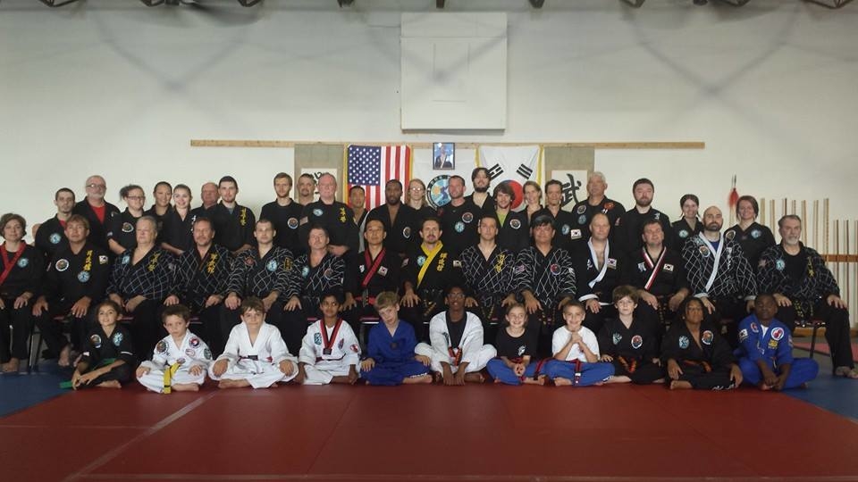 Students and instructors of Decatur Martial Arts Academy gathered in the dojang.